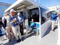 1008280152 ma nb NantucketFerry  Members o the Thorny Lea Golf Club in Brockton prepare to board the maiden voyage of the Seastreak Whaling City Express ferry service from New Bedford's State Pier to Nantucket where they will golf at the Miacomet Golf Course.   PETER PEREIRA/THE STANDARD-TIMES/SCMG : ferry, waterfront, voyage, trip, harbor